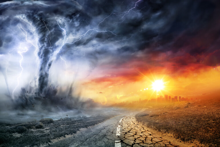 Tornado In Stormy Landscape - Climate Change And Natural Disaster Concept