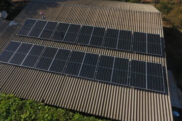 Solar panels on rooftop aerial view