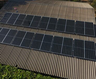 Solar panels on rooftop aerial view