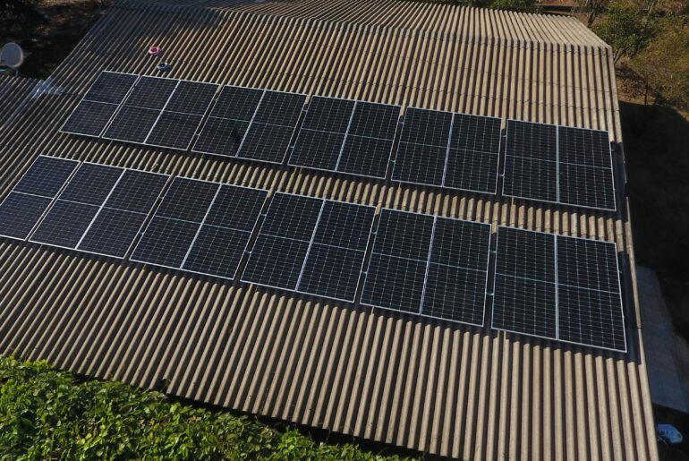 Solar panels on rooftop aerial view
